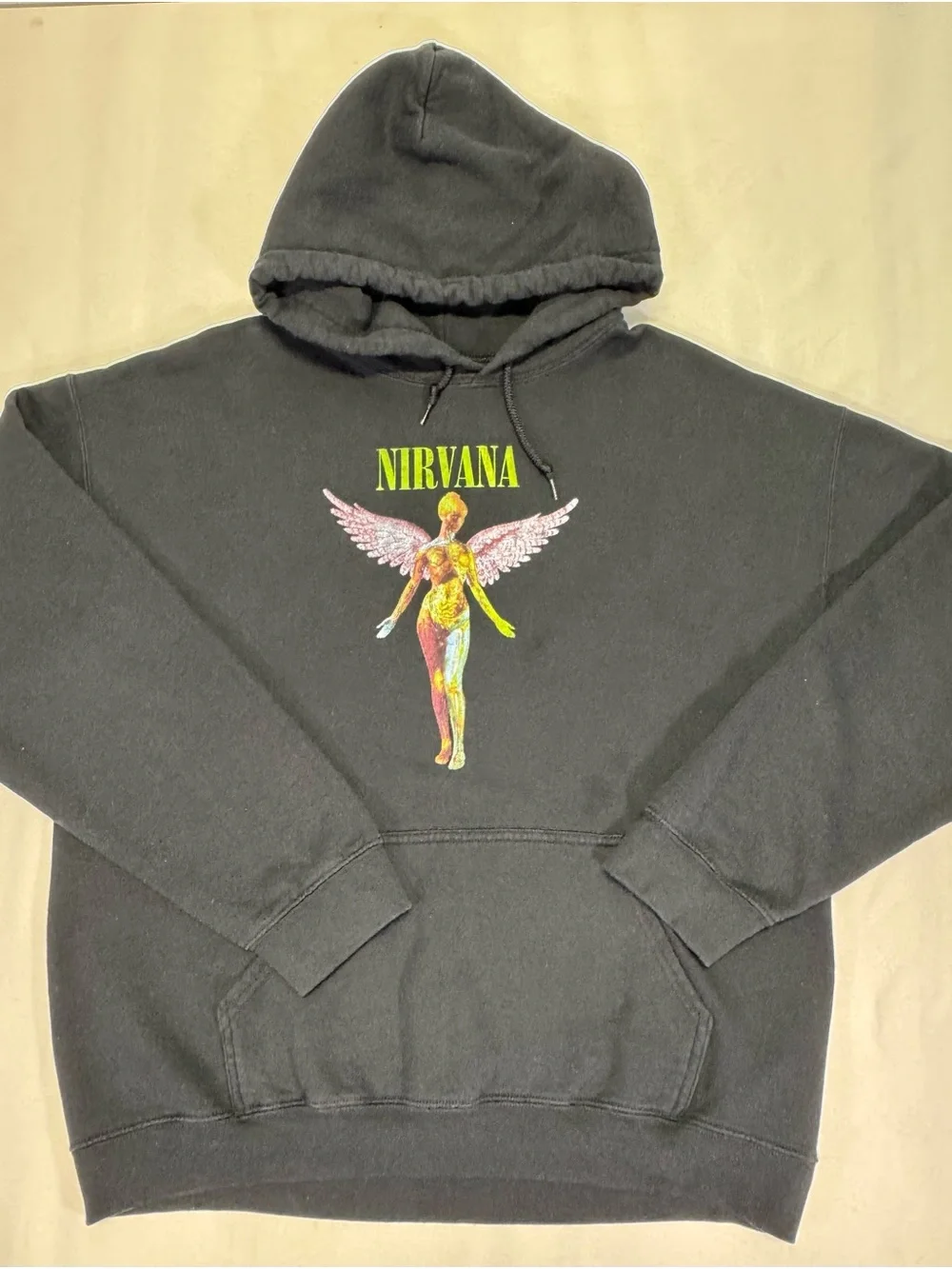 NIRVANA Black Crewneck Hoodie with Yellow-Green Logo and Multicolor Angel